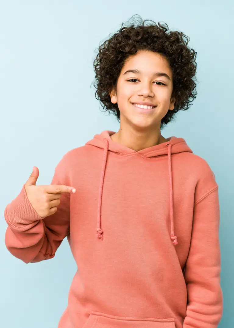 teen boy pointing confident VERTICAL